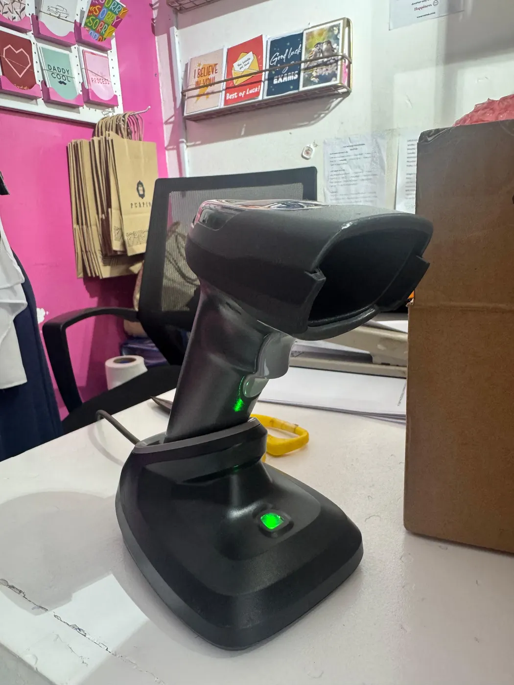 Barcode scanner dock at Purpink retail counter